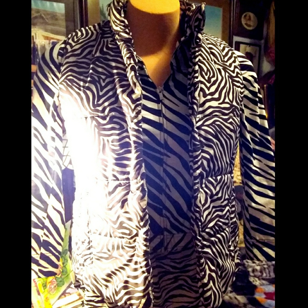 A Liz Claiborne Zebra print waterproof  vest